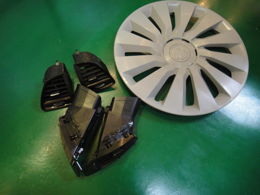 Closeup of automobile parts made from plastic injection molding