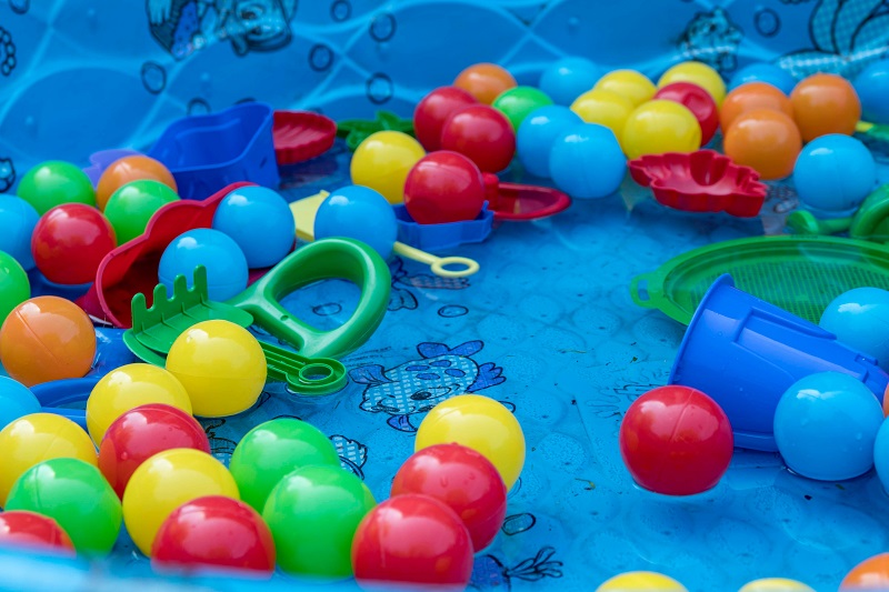 Closeup of several plastic pool toys